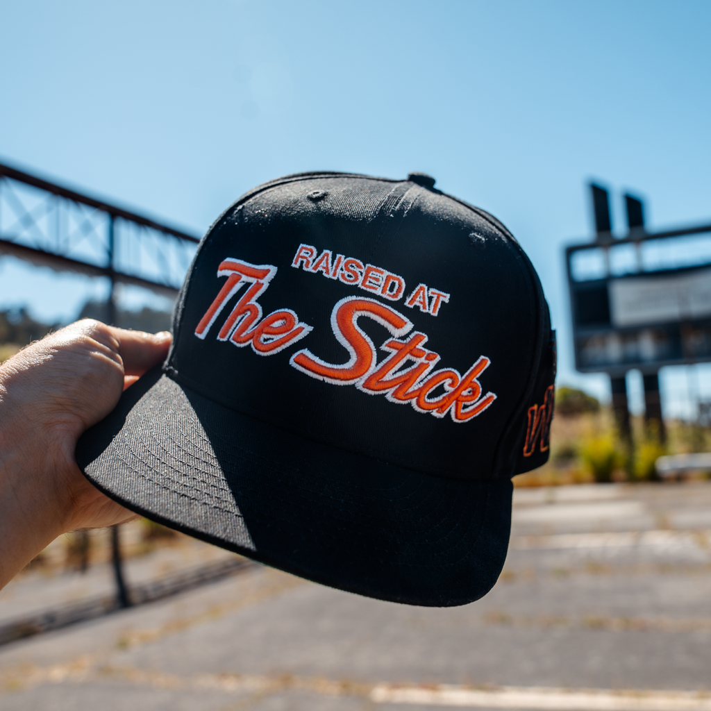 Raised At The Stick Specialties Snapback Hat